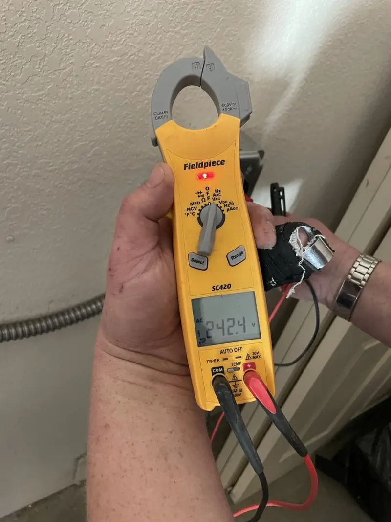 Voltage testing with clamp meter during Circuit Breaker Repair in Briar